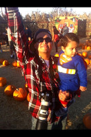 father and son in pumpkin patch 2011
